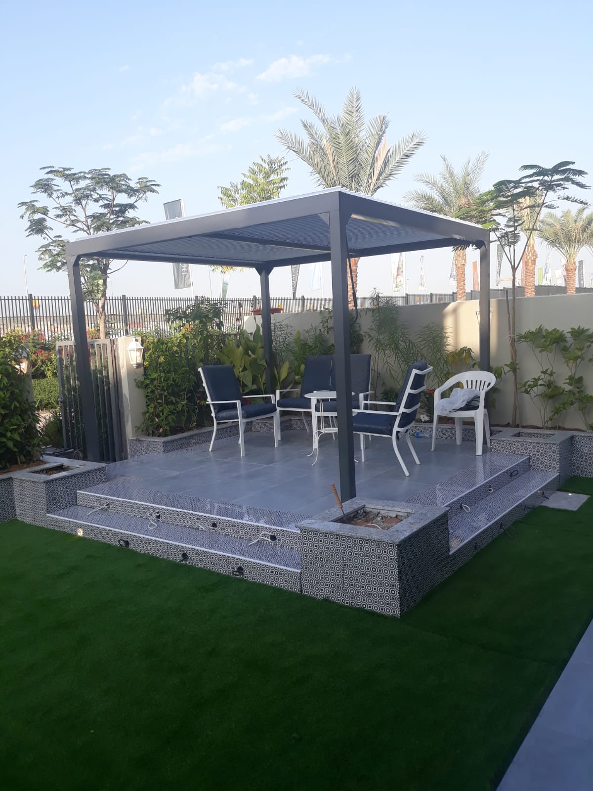 Aluminium pergola on tiled podium — Town Square townhouse
