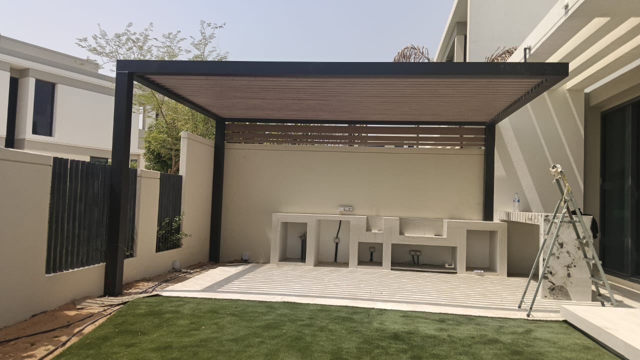 Outdoor kitchen shell & pergola — Tilal Al Ghaf villa