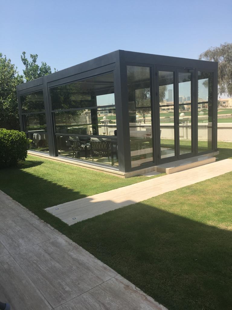 Aluminium glass garden room — Emirates Hills lawn