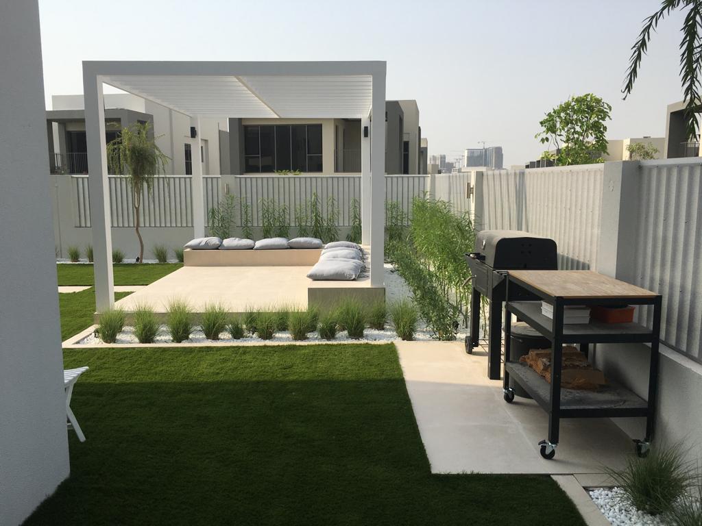 White pergola daybed terrace — Sidra villa, Dubai Hills, outdoor living project by Blue Iconic